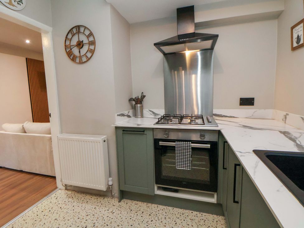 A kitchen with an oven and stove at The Cloud House @ Hoole in Chester