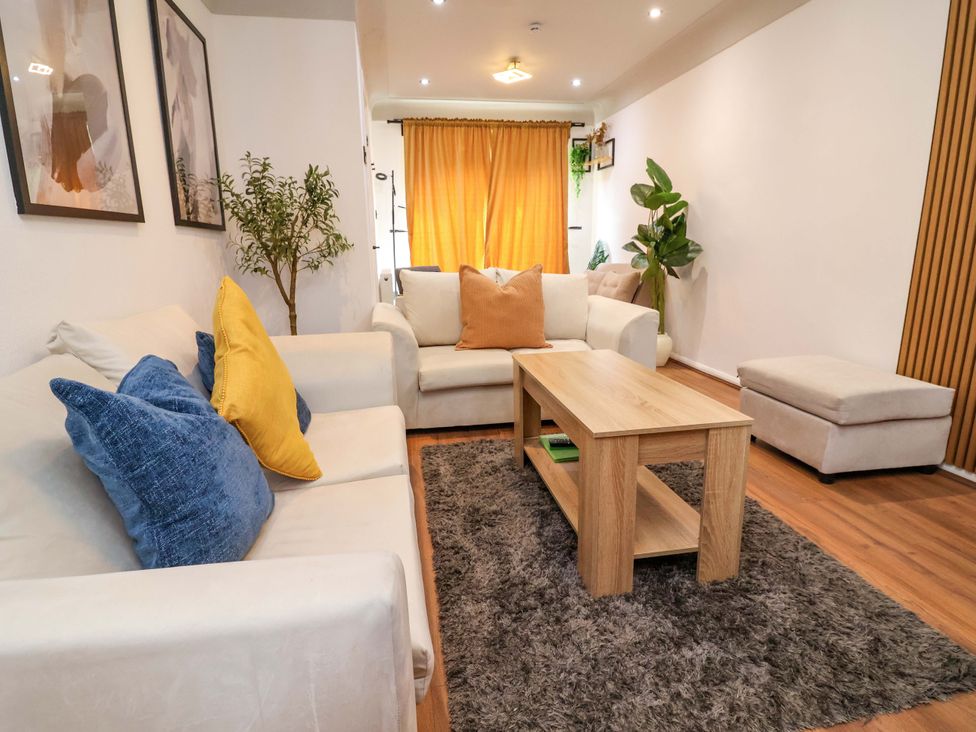 A living room with a coffee table and sofa at Steam and Stay @ Hoole in Chester