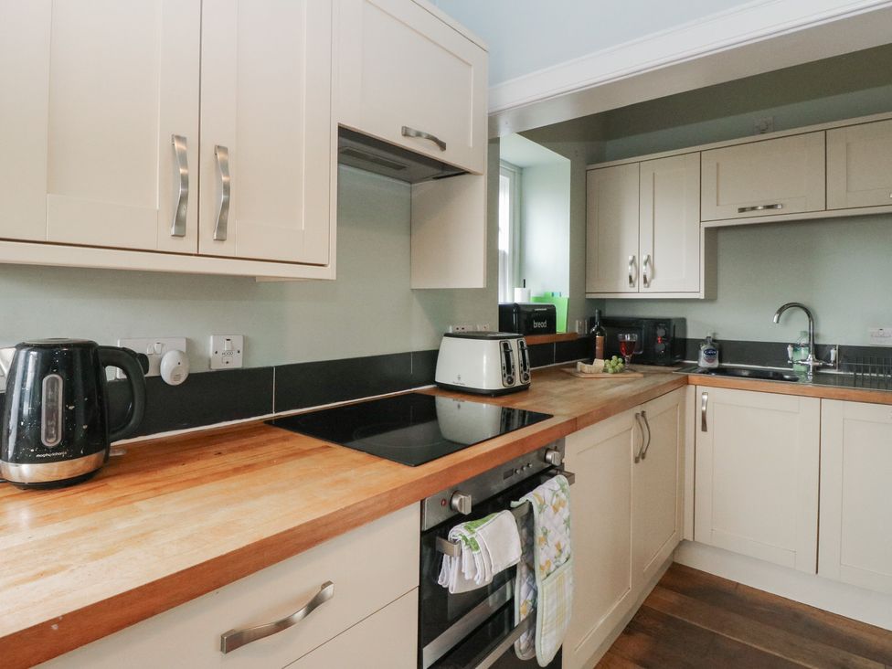 A kitchen with kettle, toaster, and stove at South Lodge in Ardpatrick near Tarbert