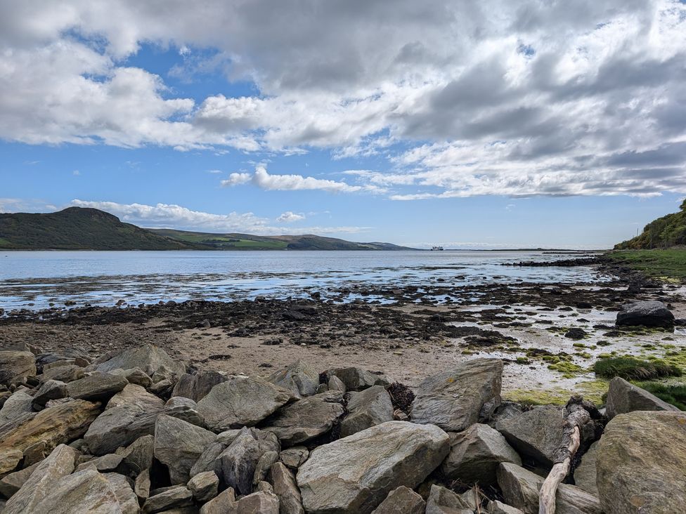 A coastal view with rocks and water at Ardpatrick South Lodge Ardpatrick near Tarbert
