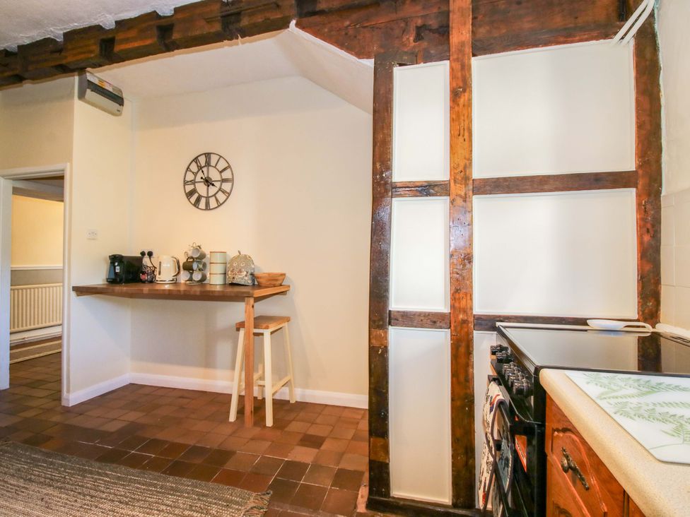 A kitchen with a worktop and coffee maker at Beach Farmhouse in Bishops Castle