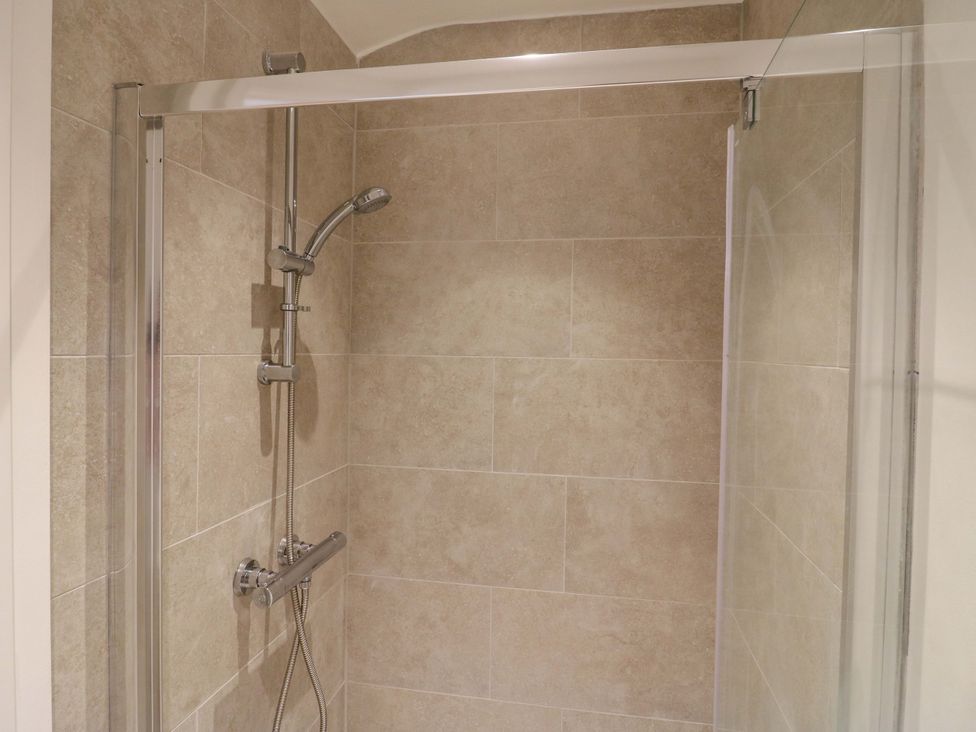 A shower with a glass enclosure at Little Yeat Farm (4 Bed/2 Bath) Aylesbury