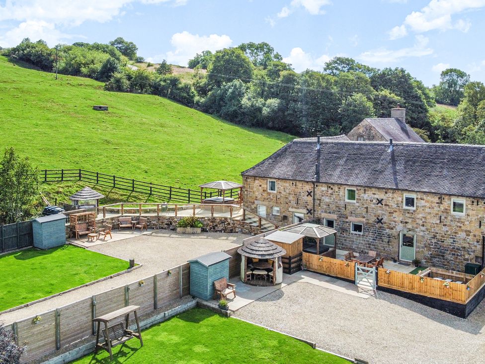 An outdoor space with a patio and seating area at Pastures Barn Bradnop near Leek