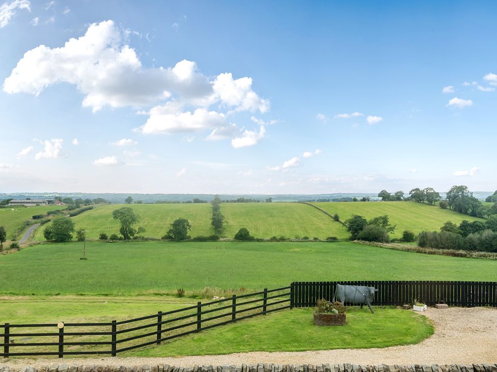 A view of fields and trees at Pastures Barn in Bradnop near Leek