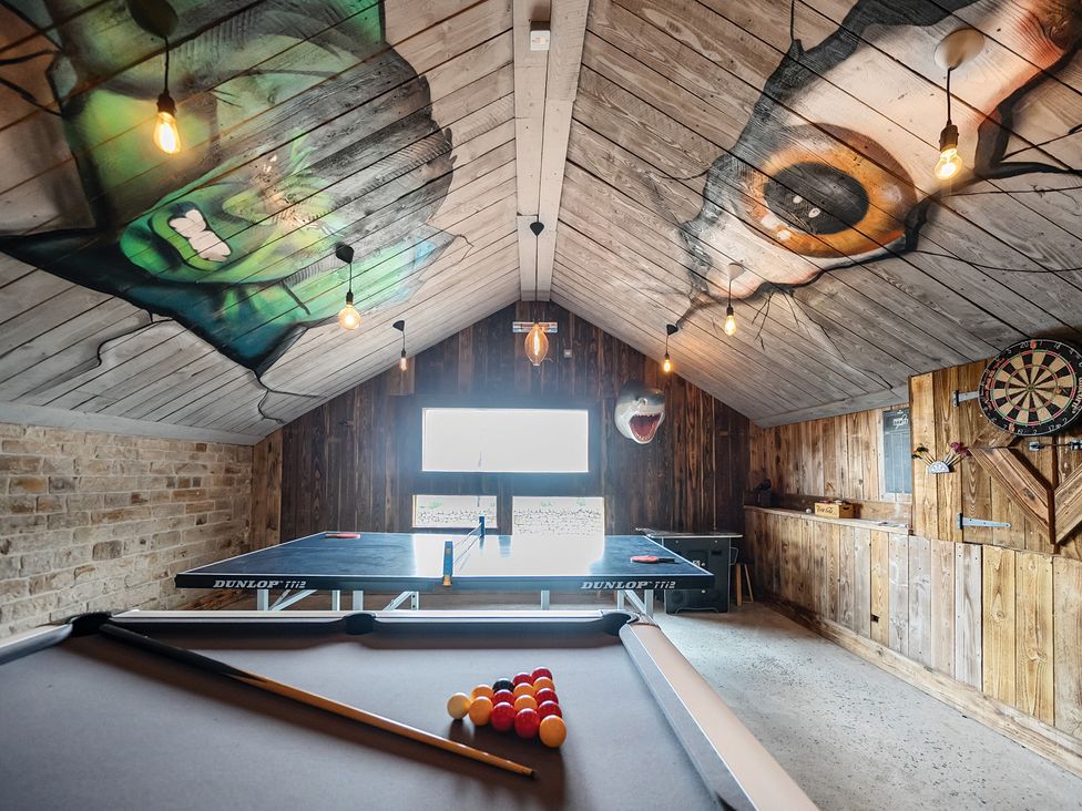 A game room with a pool table and table tennis table at HollyDale in Bradnop near Leek