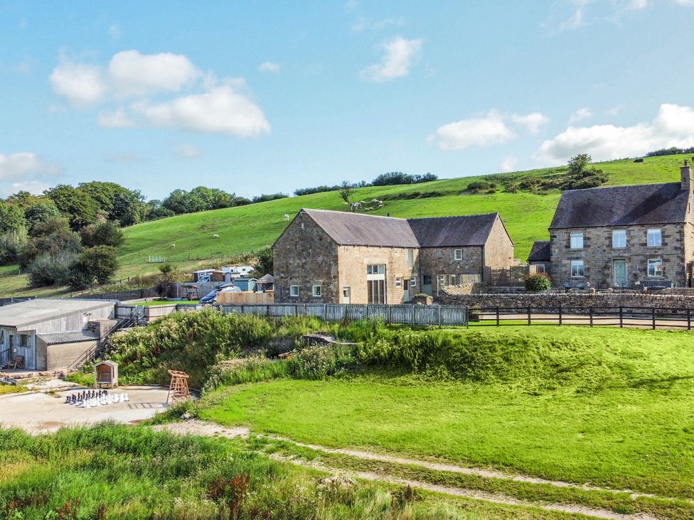 A farm building with fields and hills at HollyDale in Bradnop near Leek