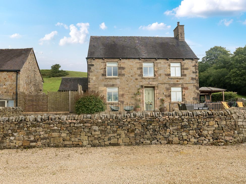 A house with stone wall and garden at HollyDale in Bradnop near Leek