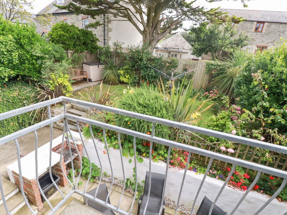A garden view from a balcony at Rosemaddon in Crantock