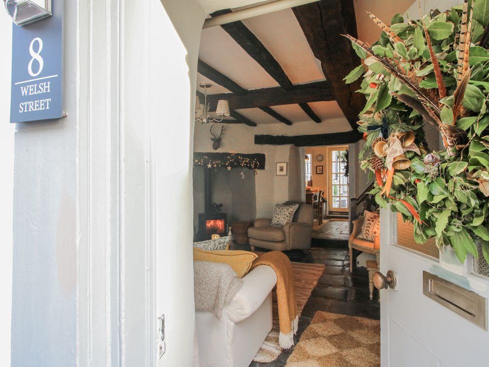 A living room view from the entrance with a wreath at 8 Welsh Street in Bishops Castle