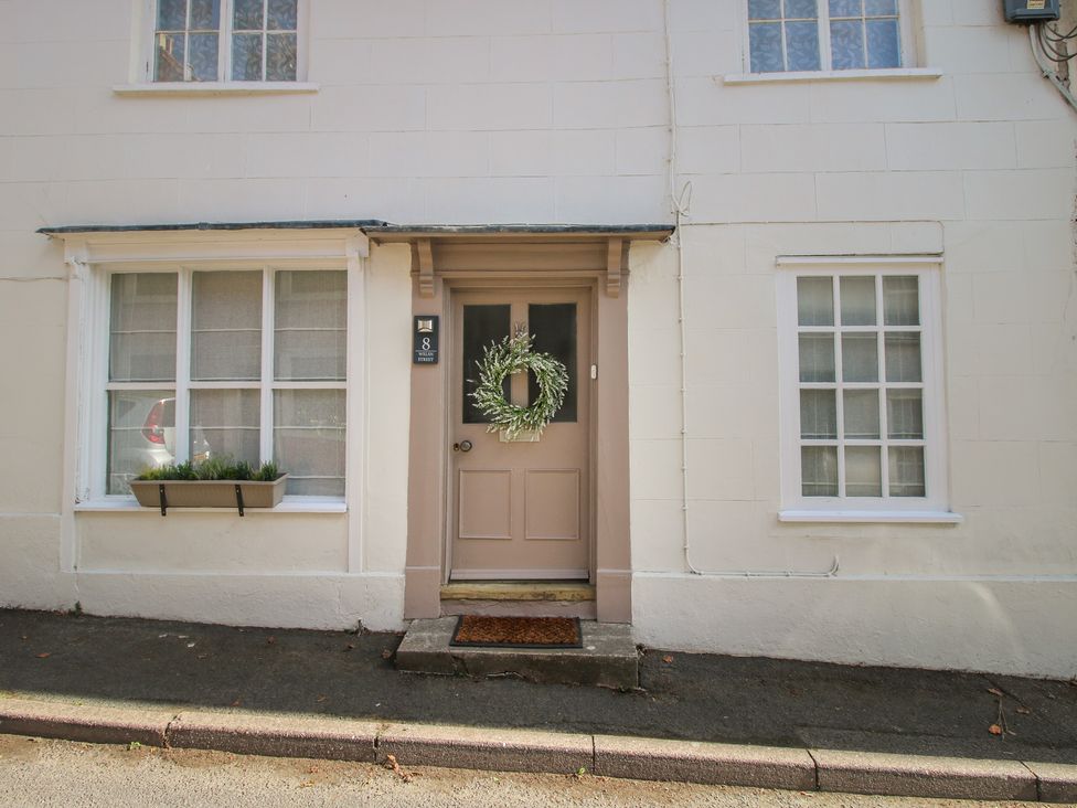 An exterior view of a house with a door and windows at 8 Welsh Street in Bishop's Castle