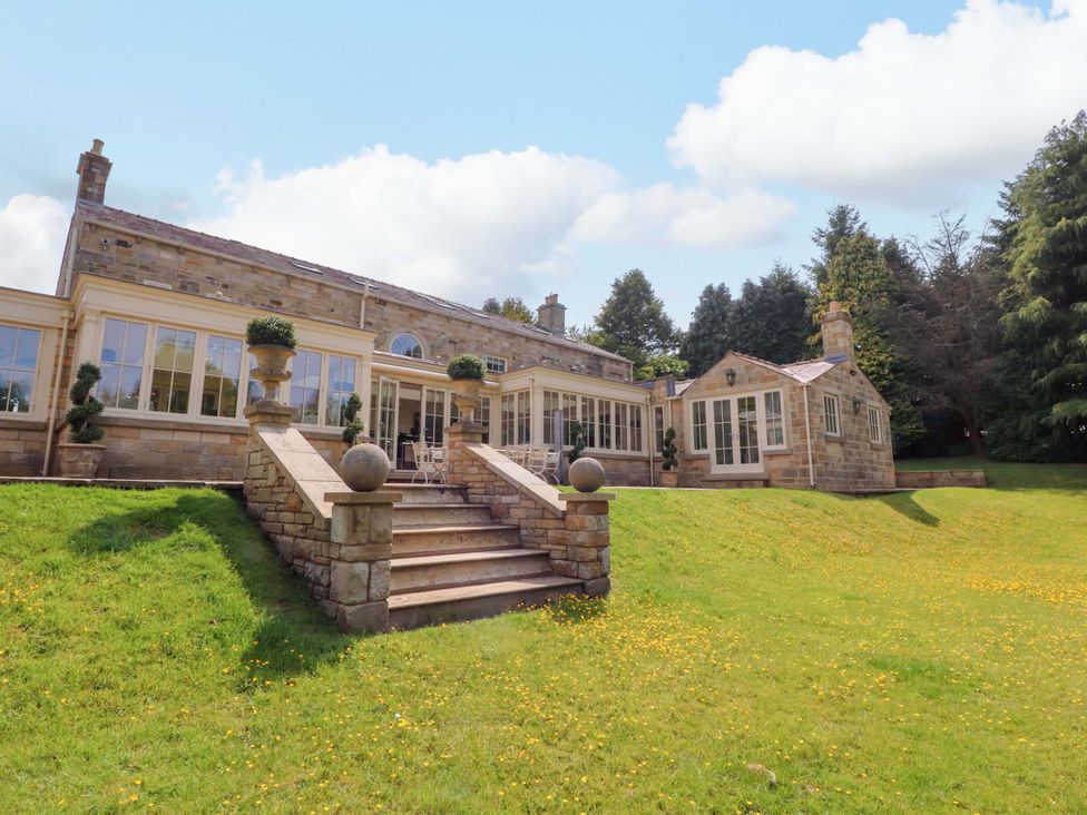 A house with large windows and stairs in Burnley at Laithe House