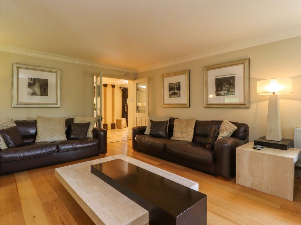 A living room with sofas and a coffee table at Laithe House Burnley