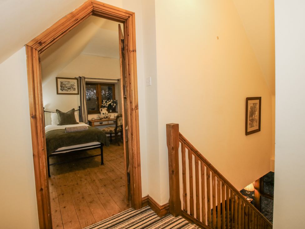 A view of a bedroom from a hallway at Upper Home Farm near Cardington