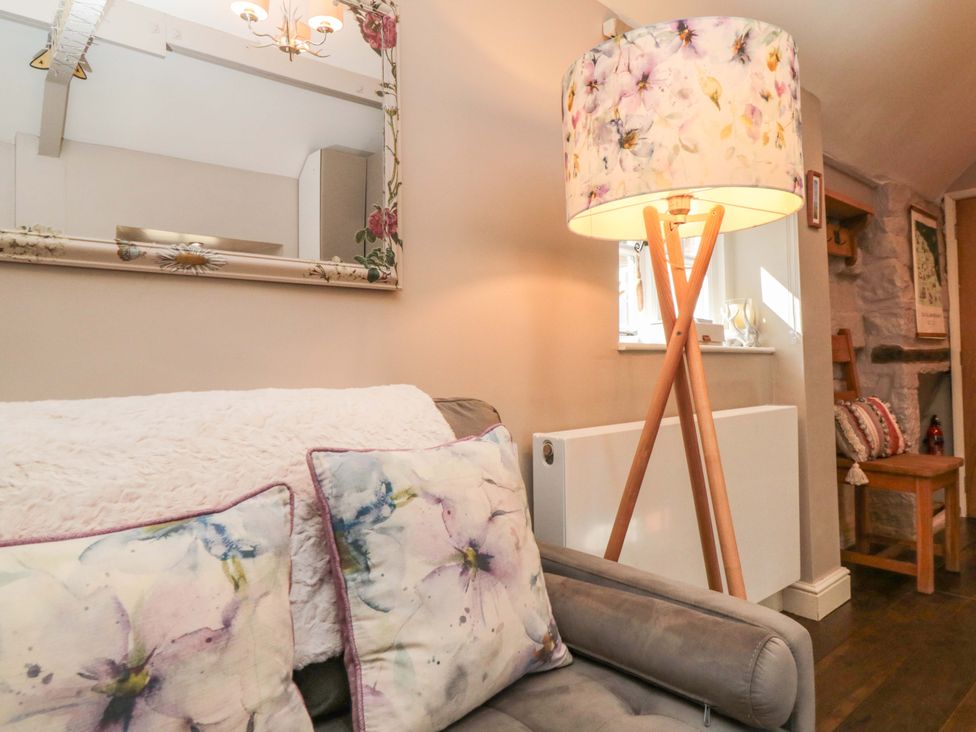 A living room with a sofa and a lamp at Maltkiln House Annexe Chop Gate near Stokesley