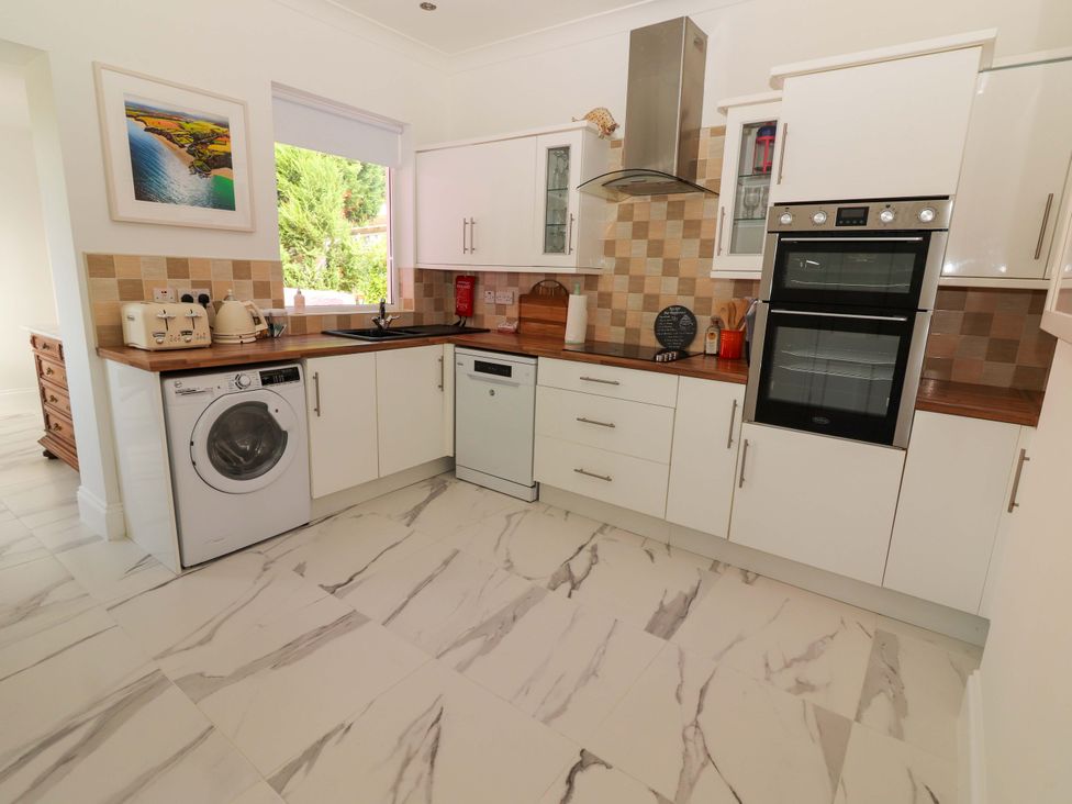 A kitchen with appliances and countertops at Rosemont in Adare