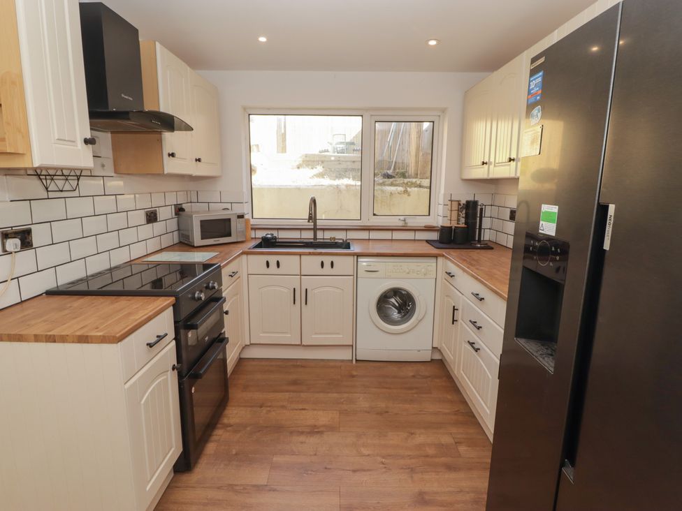 A kitchen with modern appliances at 41 St. James Street Narberth