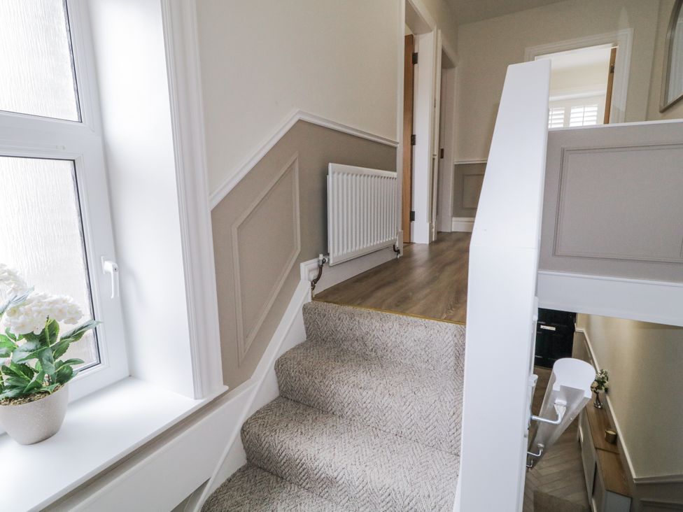 A staircase and window in a hallway at 41 Church view, Portstewart