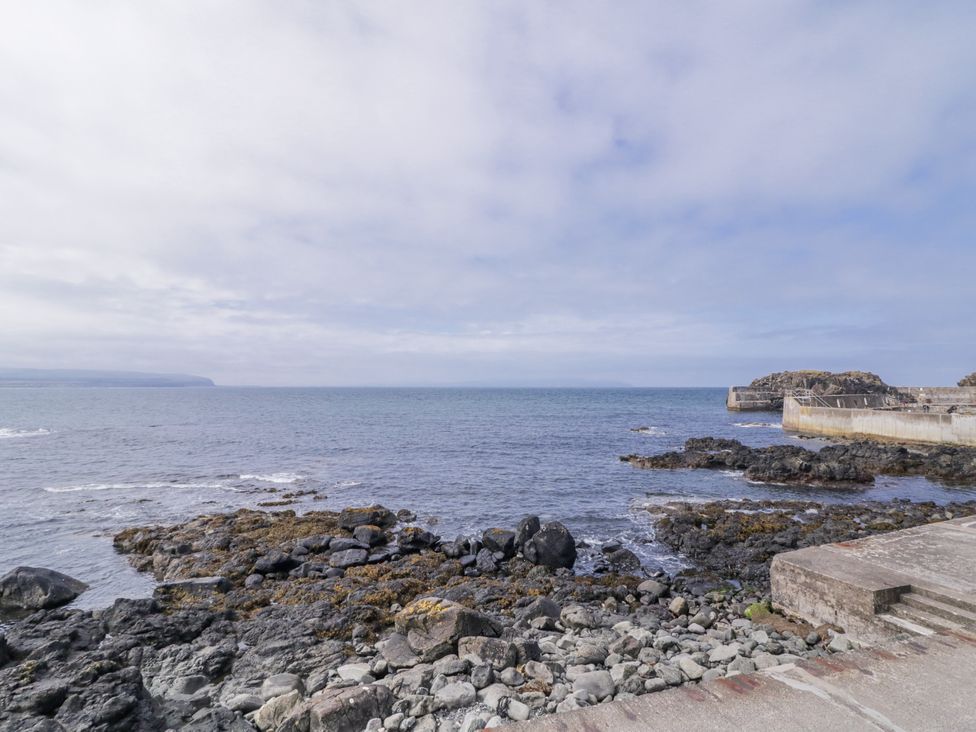 A view of the sea and rocky shoreline at 41 Church View in Portstewart