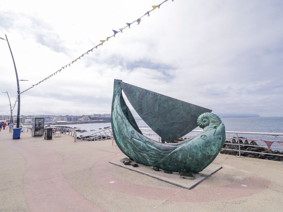 A sculpture near the ocean on a pathway at Church Studio in Portstewart