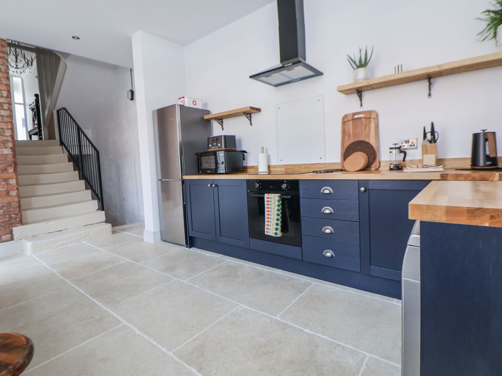 A kitchen with modern appliances and wooden countertops at 33 Lorne Street Chester