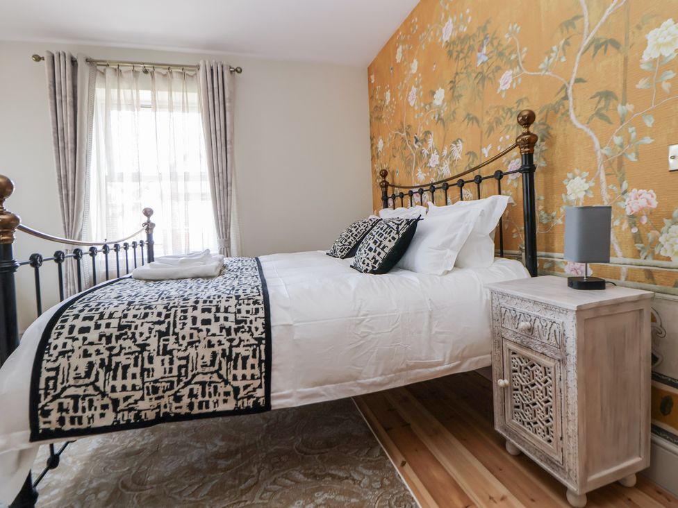 A bedroom with a bed and bedside table at 33 Lorne Street Chester