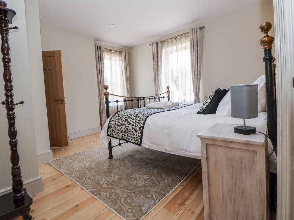 A bedroom with a bed and nightstand at 33 Lorne Street Chester