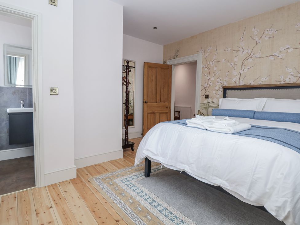 A bedroom with a bed and a bathroom in view at 33 Lorne Street, Chester