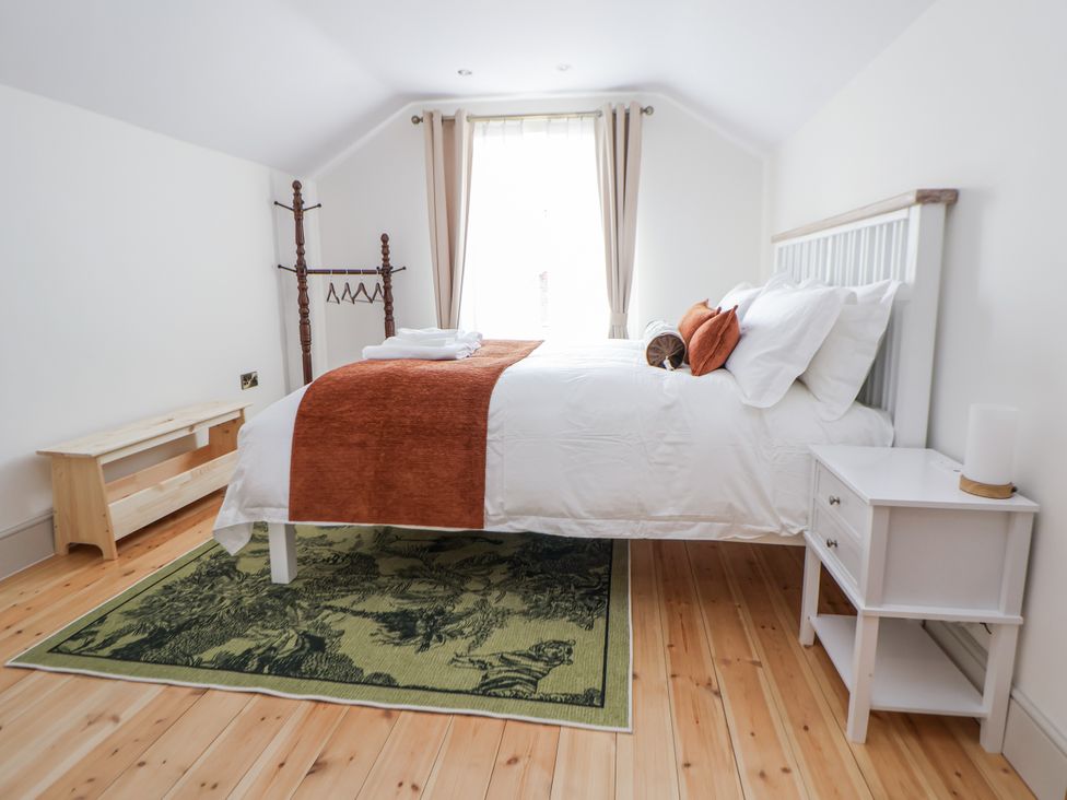 A bedroom with a bed and bedside table at 33 Lorne Street Chester