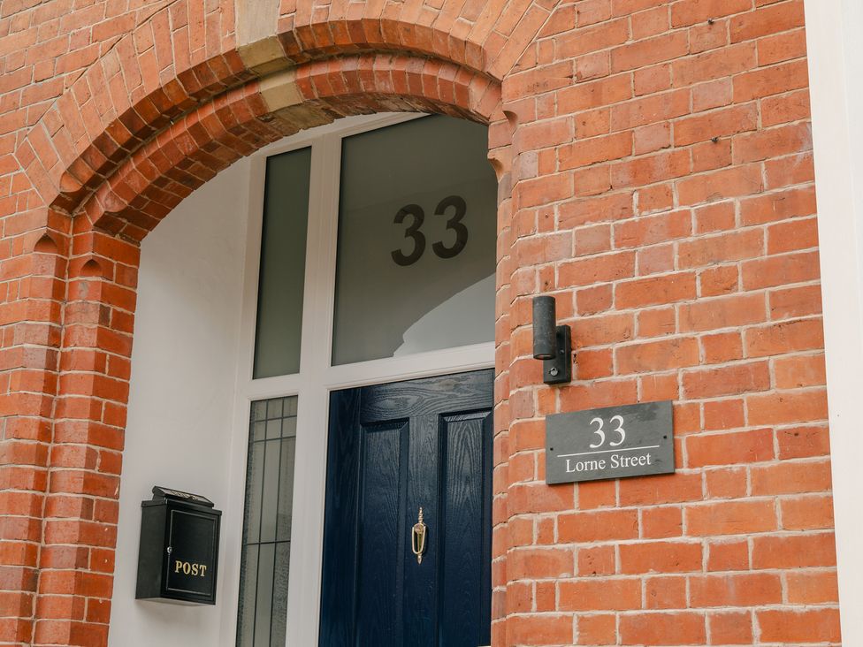 An entrance with a blue door and mailbox at 33 Lorne Street Chester