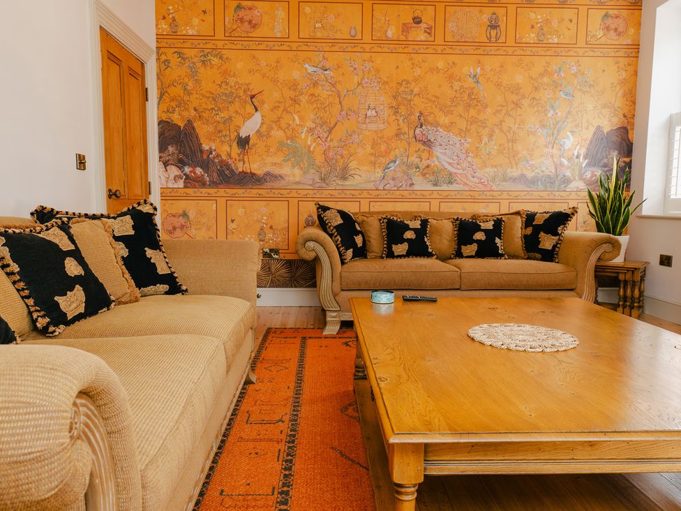 A living room with a sofa and coffee table at 33 Lorne Street Chester