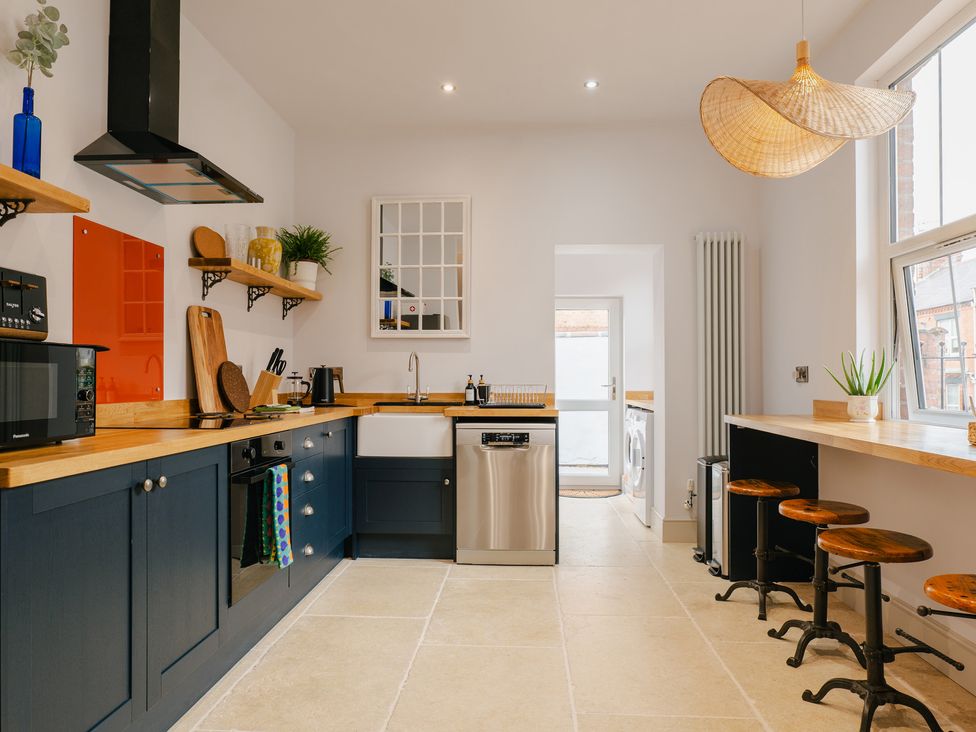 A kitchen with counter, sink, and appliances at 33 Lorne Street Chester