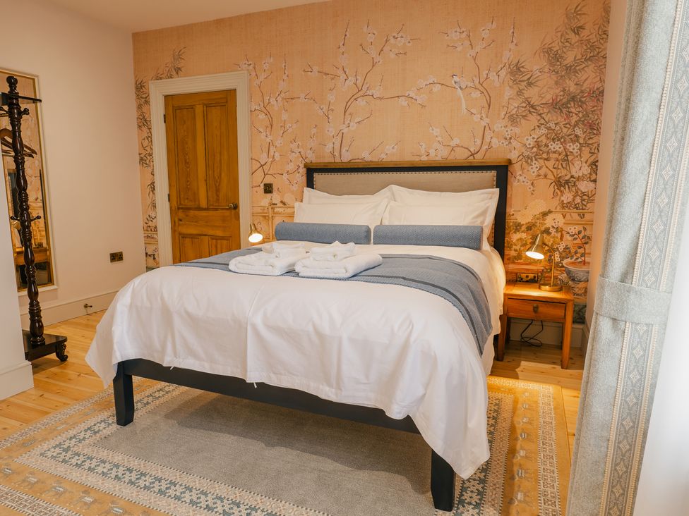 A bedroom with a bed and bedside table at 33 Lorne Street Chester