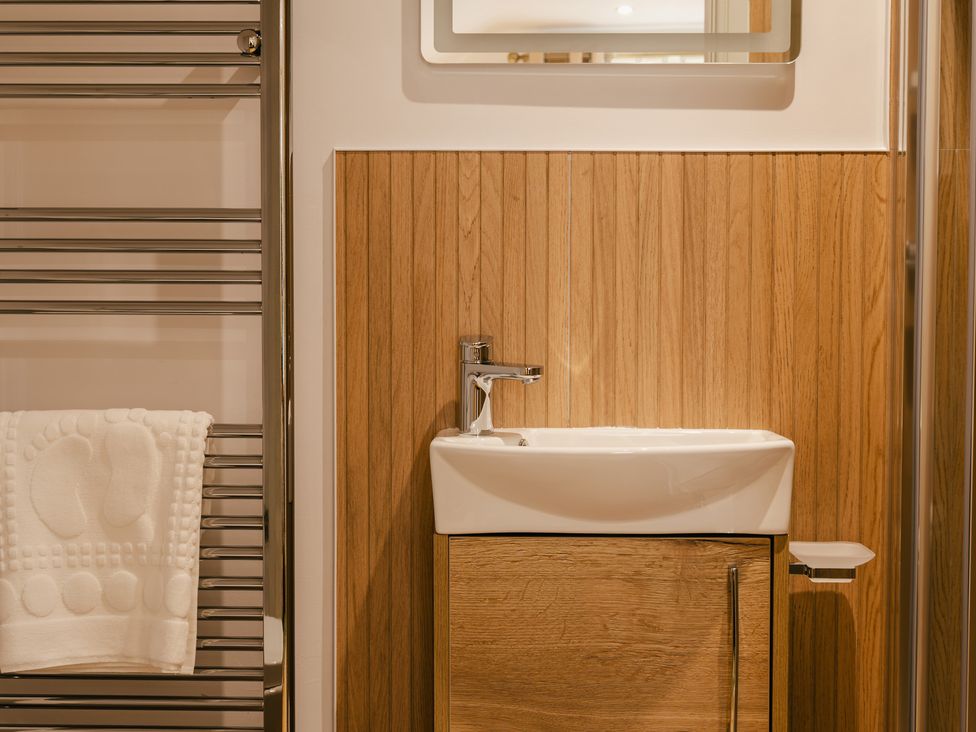 A bathroom with a sink and towel rack at 33 Lorne Street Chester