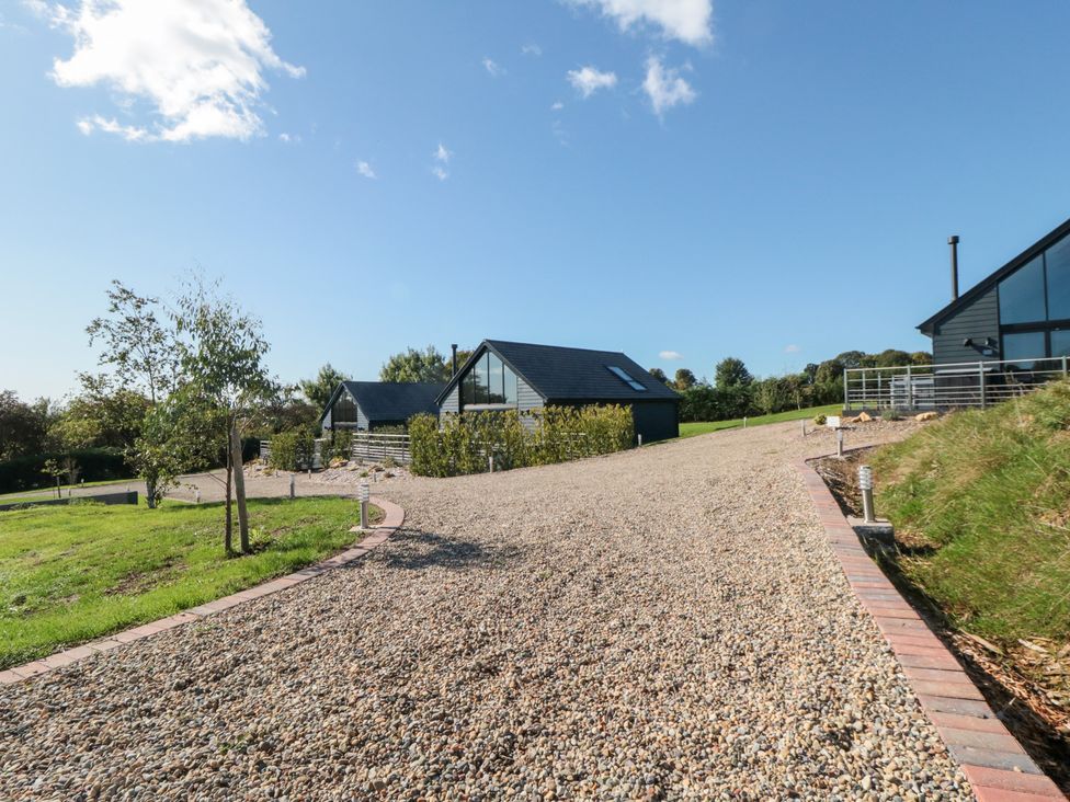 A gravel driveway leading to houses at Hare's Hill in Thornton-Le-Dale