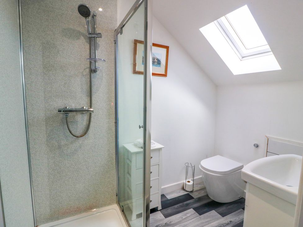A bathroom with a shower and toilet at Ailsa View in Girvan
