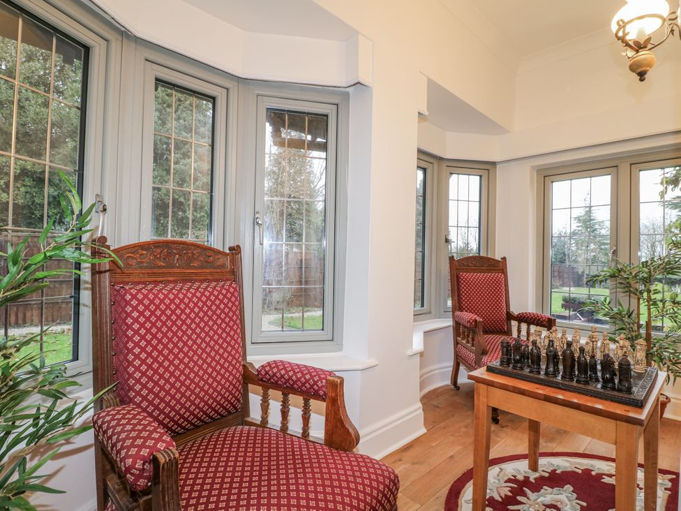 A snug with chess set and two chairs at Mellbreak in Ashby-De-La-Zouch