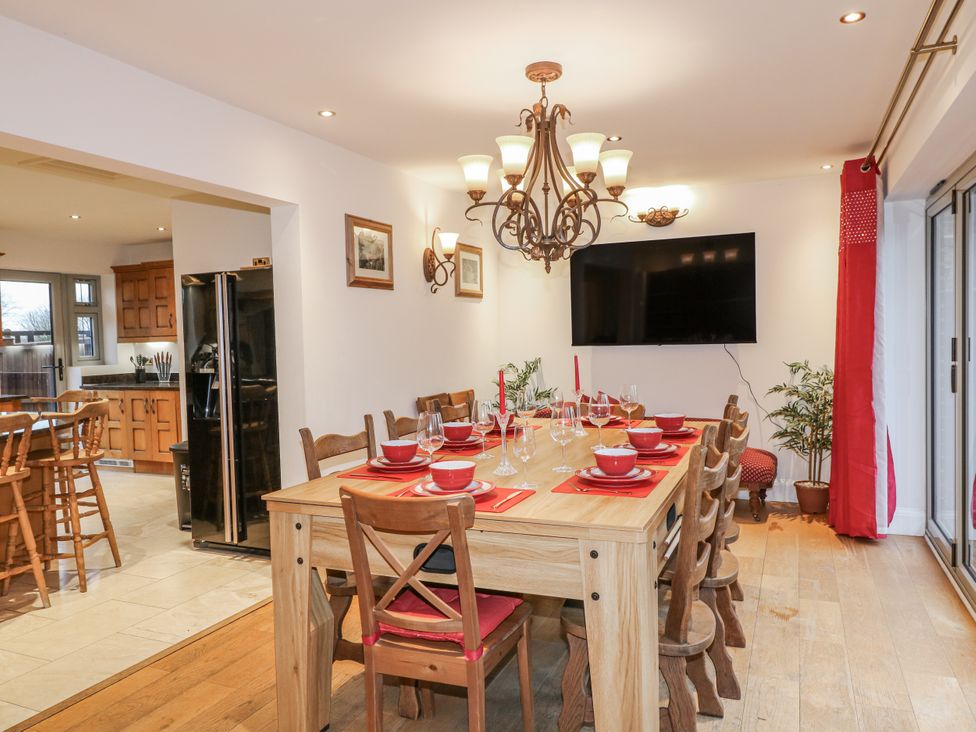A dining room with a large table and chairs at Mellbreak in Ashby-De-La-Zouch