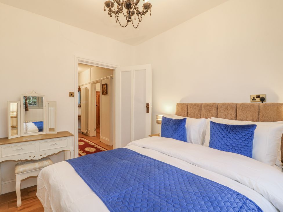 A bedroom with a bed and dresser at Mellbreak in Ashby-De-La-Zouch