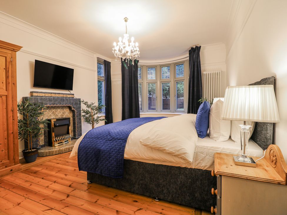 A bedroom with a bed and a television at Mellbreak in Ashby-De-La-Zouch