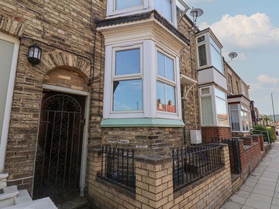 An exterior view of a house with windows and a gate at 174 High Street Marske-By-The-Sea