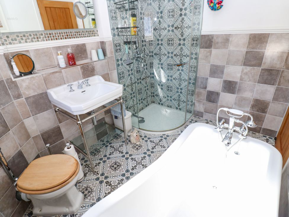 A bathroom with a sink and toilet at The Museum in Nenthead