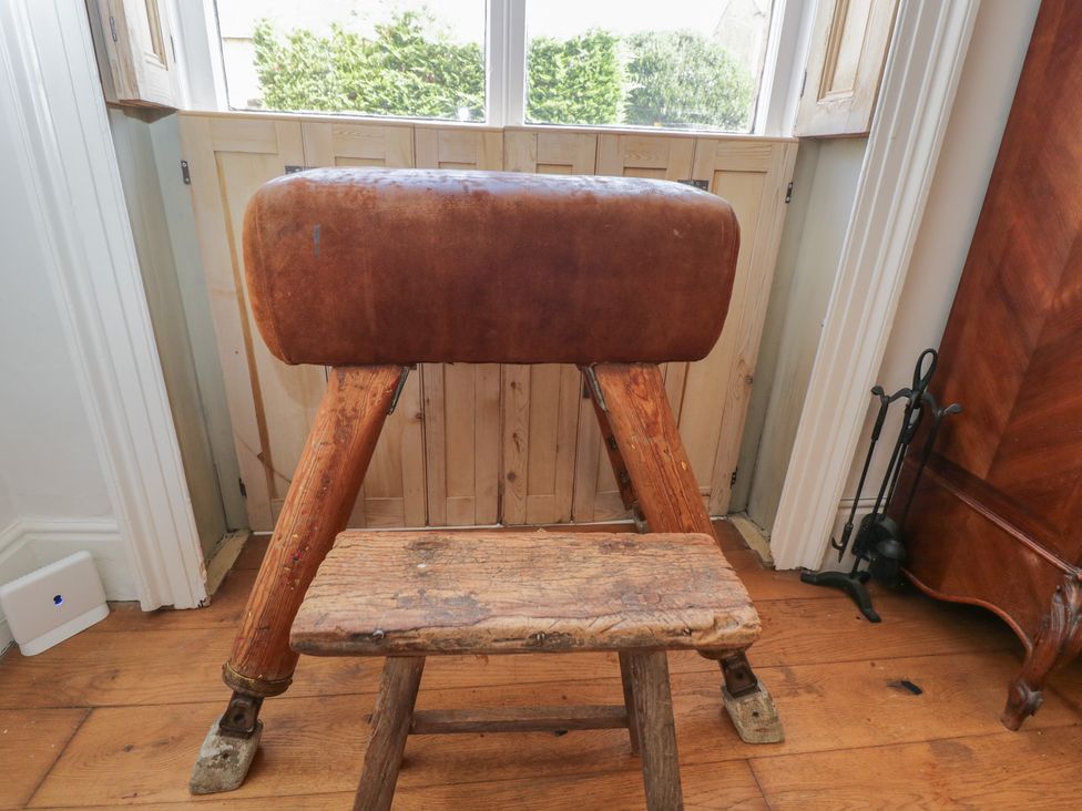 A gymnastics pommel horse in a living room at Cotswold House in Moreton-In-Marsh