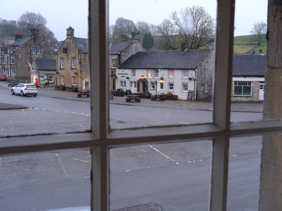 View of the Dewdrop Inn and surrounding area from a window at Rose Cottage in Hartington