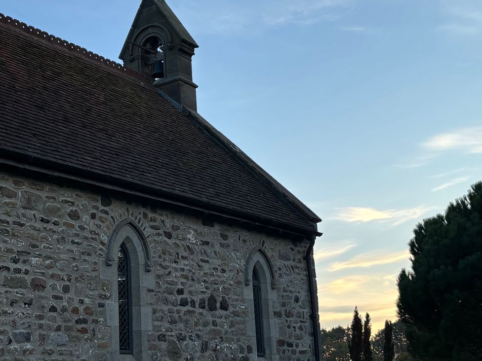 A church with a bell tower at St Edmunds Church in Fraisthorpe