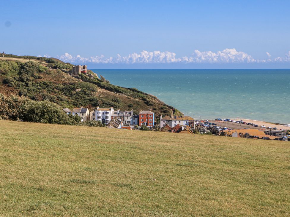 A coastal view with buildings and sea at 108 Emmanuel Road in Hastings
