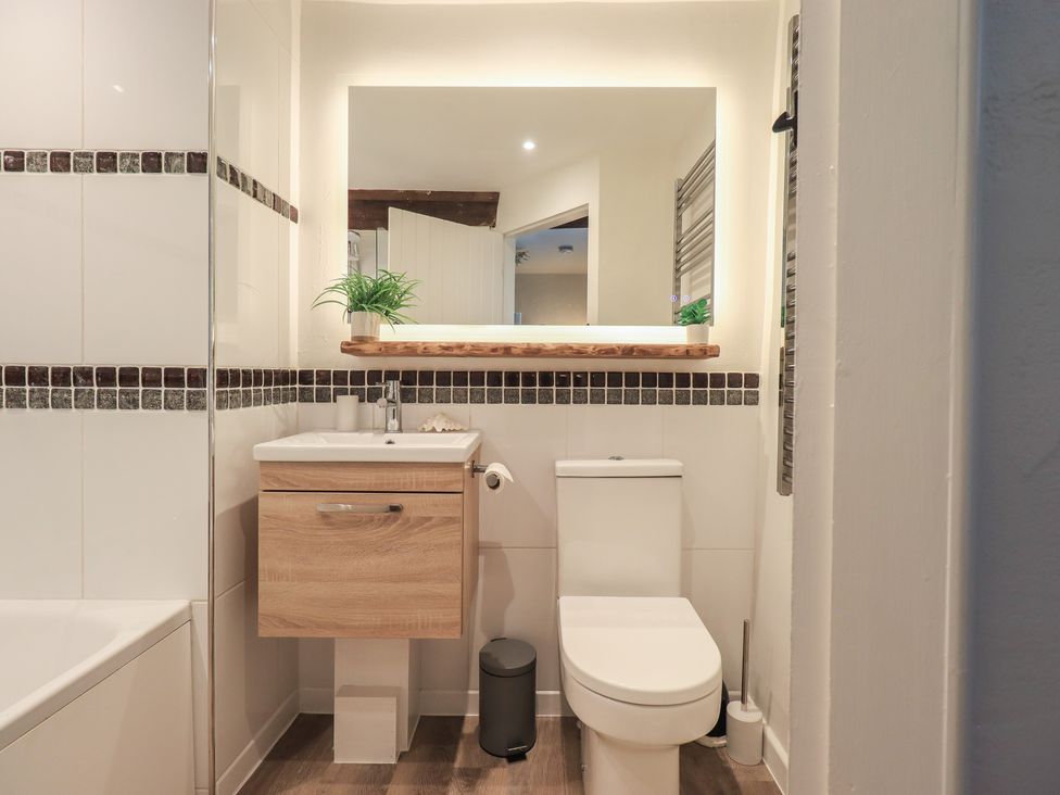 A bathroom with a sink and toilet at Daffodils in Ambleside
