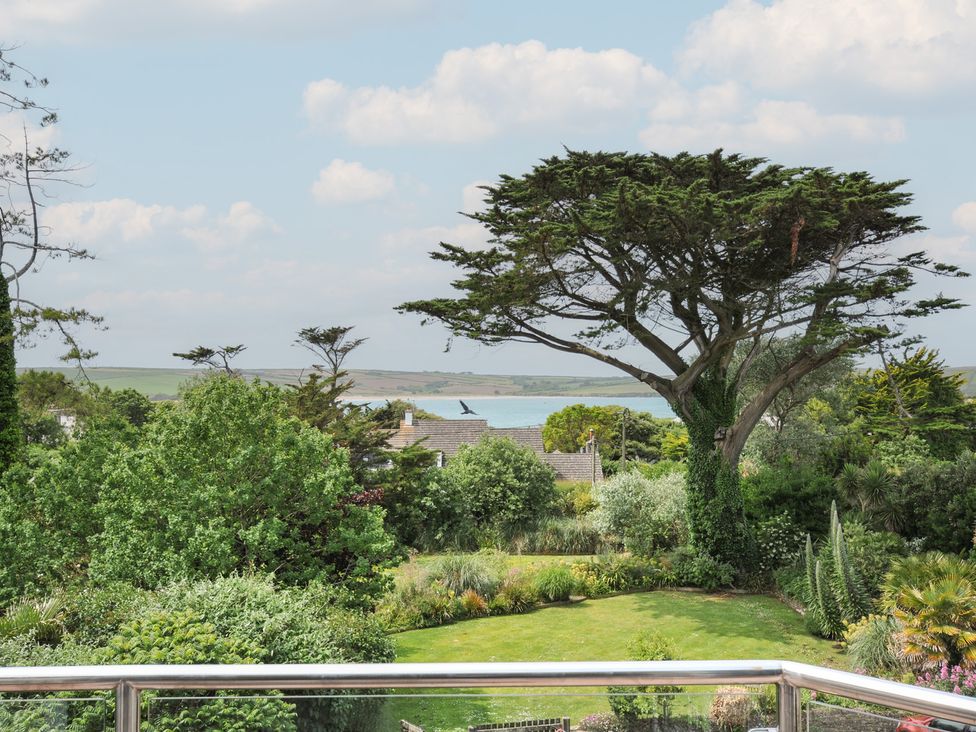 A view of trees and ocean at Bodare 8 Daymer Bay