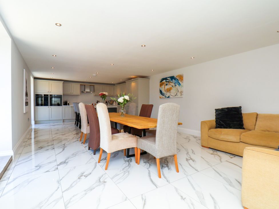 A dining room with a table and chairs at Plot Four - Italian Terraced Garden Harpham near Nafferton