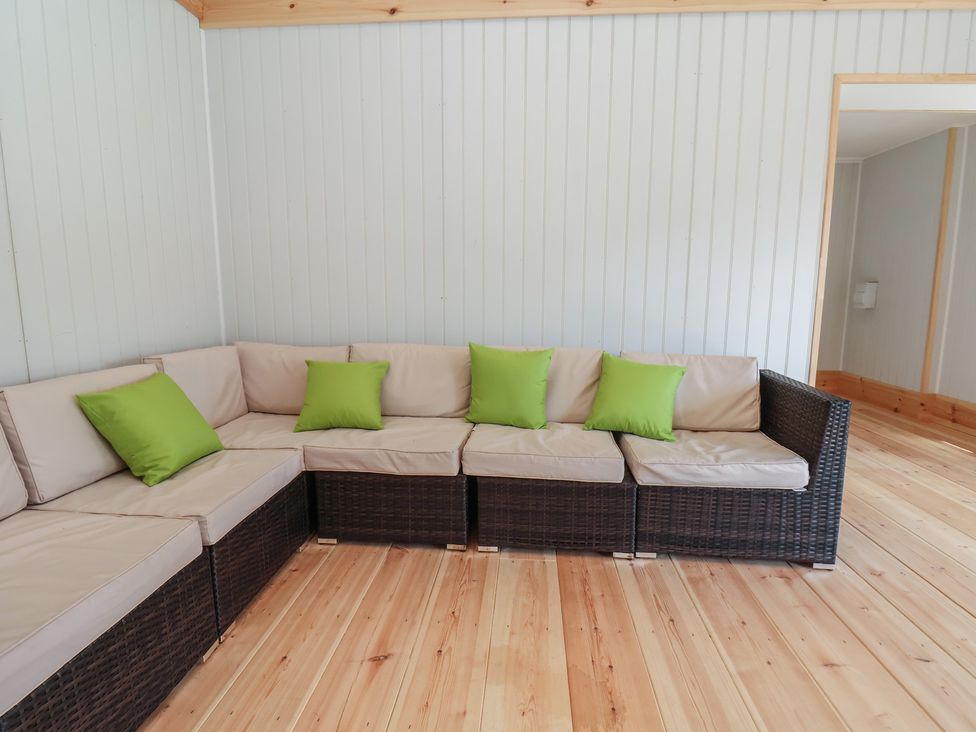 A seating area with a sofa in Harpham Manor House Harpham near Nafferton