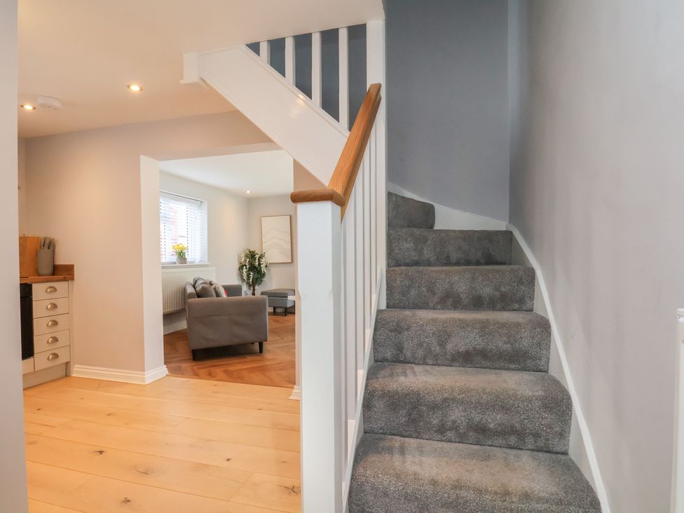 A staircase leading to an upper level in Manor Cottage Harpham near Nafferton